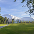 A logarithmic curve forms the geometry of the roof