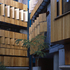The staggered panels of the timber shutters