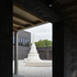 In one courtyard sits a large white limestone stupa monument