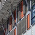 Metal louvres and brightly coloured panelling on the façades