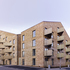 The distinctive colour of the balconies was carefully chosen to complement the colour of the brickwork
