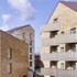 Fifty-three flats are arranged in three linear blocks across the site