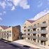 London stock brick brings texture and variation, contrasting with anodised aluminium balconies