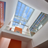 The continuous rooflight separates the new structure from the original
