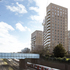 The scheme sits next to a railway line