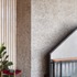 The concrete forms an internal monumental orthogonal ‘proscenium’ arch as a central structural spine for the house