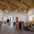 The ceilings of the canopy and interiors are articulated by timber beams