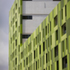 Red, yellow, and green cladding mirrors the colours of the Ghanian flag