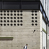 Perforated, solid and glazed elements make up the exterior