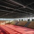 The space is lit by glazing around a gallery-cum-walkway