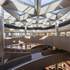 A vast atrium looks up to a huge skylight