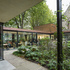 A courtyard garden is at the eastern end of the building