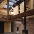 The architect conceived the conservation and redevelopment of the building as a matter of encasing existing elements in a light-filled shell 