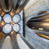 The atrium walls are a sandwich of the original concrete with horizontal steel ring reinforcements