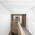 Corridors run the length of the courtyard side