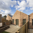 Suffolk Close is located on a site bordered by a railway line to the north and a main drainage route to the south
