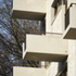 The cantilevered precast concrete balconies