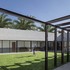 On sunny days with blue skies, the corridor fills with sunlight from the courtyard