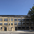 The De Beauvoir Block was conceived as a settlement of lightweight rooftop studios atop a terrace of masonry buildings