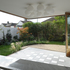 The existing tall hedge and boundary walls meant that a 