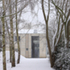 Timber framing in the perimeter walls, together with plywood sheathing, provides longitudinal and lateral stability