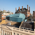 The project creates two distinctive performance spaces and improves connectivity within an existing historic ensemble of buildings