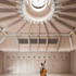 A single roof oculus with operable shading allows the space to be flooded with daylight when appropriate