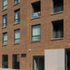 The red brick of the street frontage