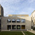 By mirroring Giles Gilbert Scott