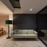doma_architects-woven_brick_house-interior_night_time