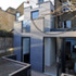 003_view_of_the_stacked_boxes_and_glass_ribbons_c_space_group_architects