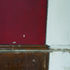 The restoration revealed the original colour of the ground floor lecture room - a Pompeiian red that has been matched and repainted