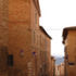 Looking down via Saffi, past the church that is absorbed into Il Magistero, to the campagna beyond