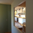 Kitchen shelving through the dining booth