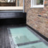 Rear terrace with bench seat (encloses natural ventilation inlet to basement)
