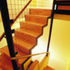 The stair lightens as it rises