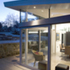 The roof floats above the glazed extension