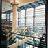 The architect wanted the central concrete structure to stand alone, appearing to be completely separate from the surrounding offices and meeting rooms, creating a sense of excitement when crossing the two-storey-high bridges
