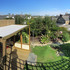The project encloses the garden from the street to create a more private space