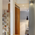 View from stairs landing of space beyond