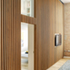 Fin door ajar revealing bedrooms beyond
