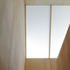 The opaque openeing at the top of the stairs 