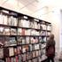 Woman in front of Bookshelf