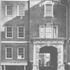 The arch linking Whittaker Sqaure to Town Square. The first floor venetian window and the eared architrave to the window aove it reveal Terry