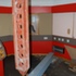 Existing interior with central structural prop