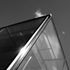 When viewed from outside, the neatly defined top edge created by the glass-to-glass junction gives seamless reflections of the sky.
