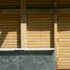 Copper roof sheet and flashings protect vulnerable oak members and joints, and junctions between glass and timber.