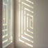 Etched glass window on western facade, designed by Martin Richman