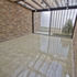 The interior of the glass and timber extension, 