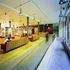 A brick ramp leads to the reception area and ground-floor gallery